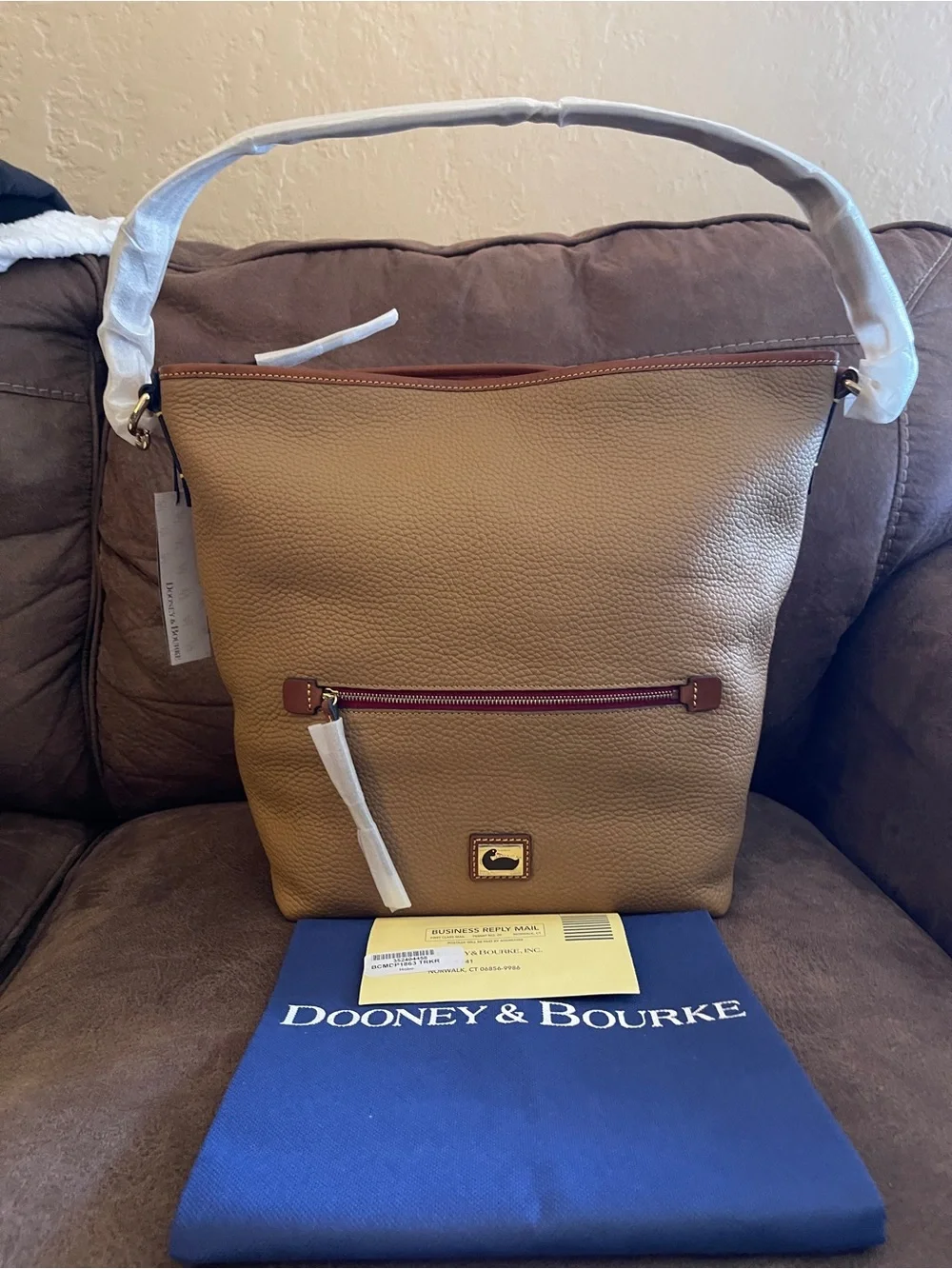 Dooney & Bourke Tan Pebbled Leather Bag with Brown Trim